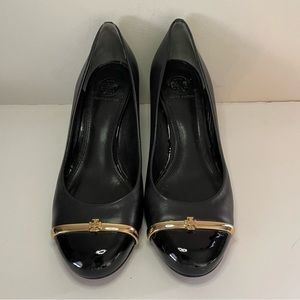 Tory Burch pacey black wedge heel pumps with gold bar.  Sz 7